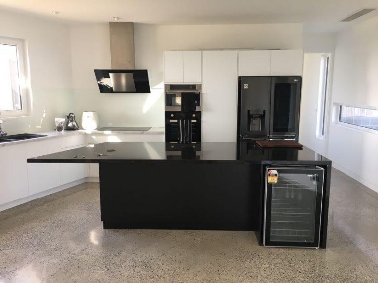 Kitchen White Cabinets and Black Island Bench Geelong